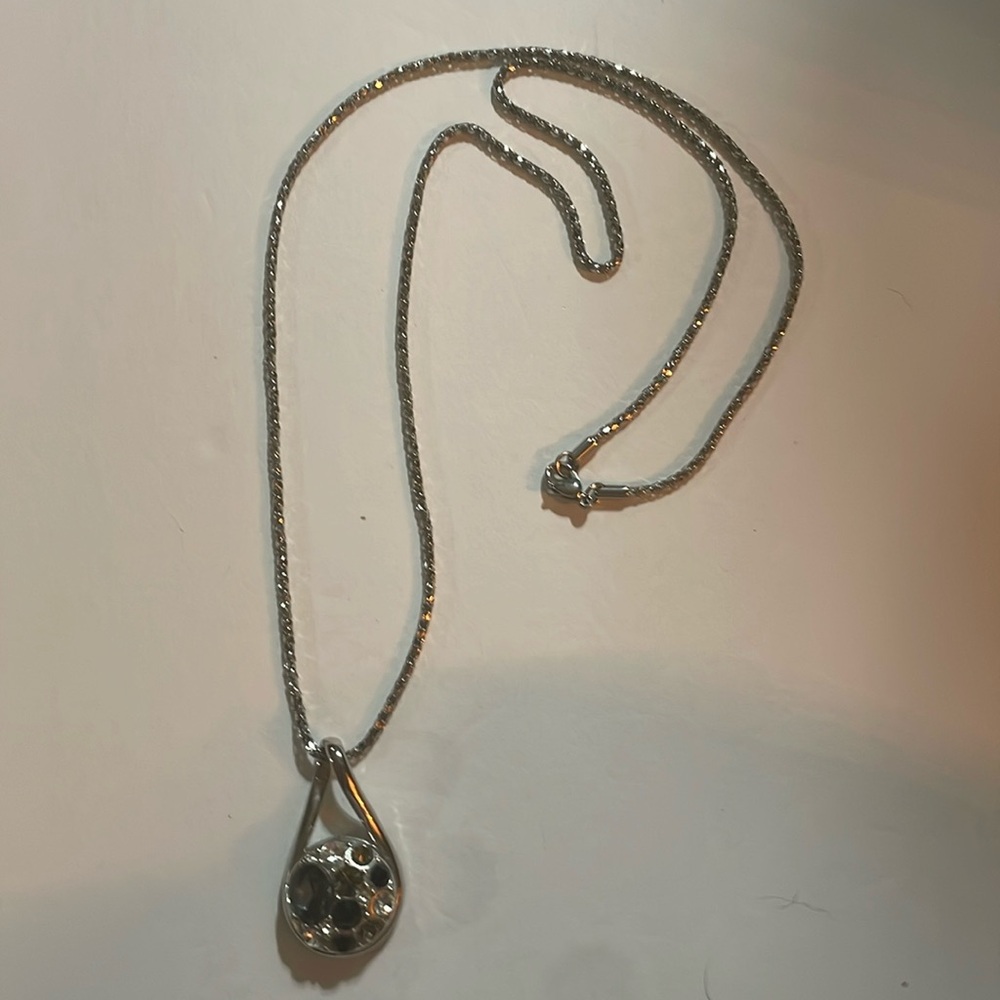 Women’s silver necklace with black and silver gemstones